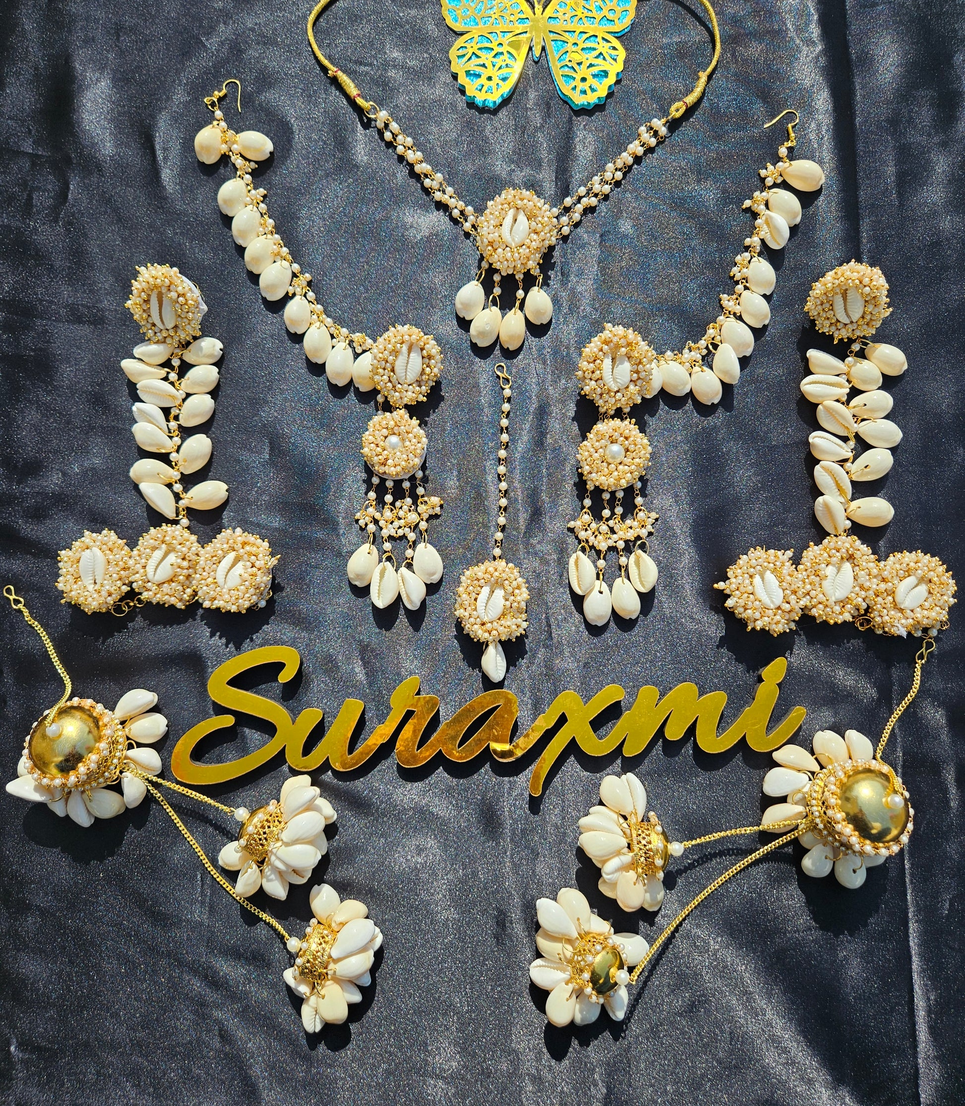 Shell with pearl jewellery