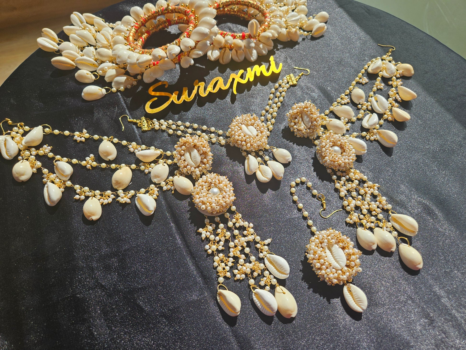 Shell with pearl jewellery