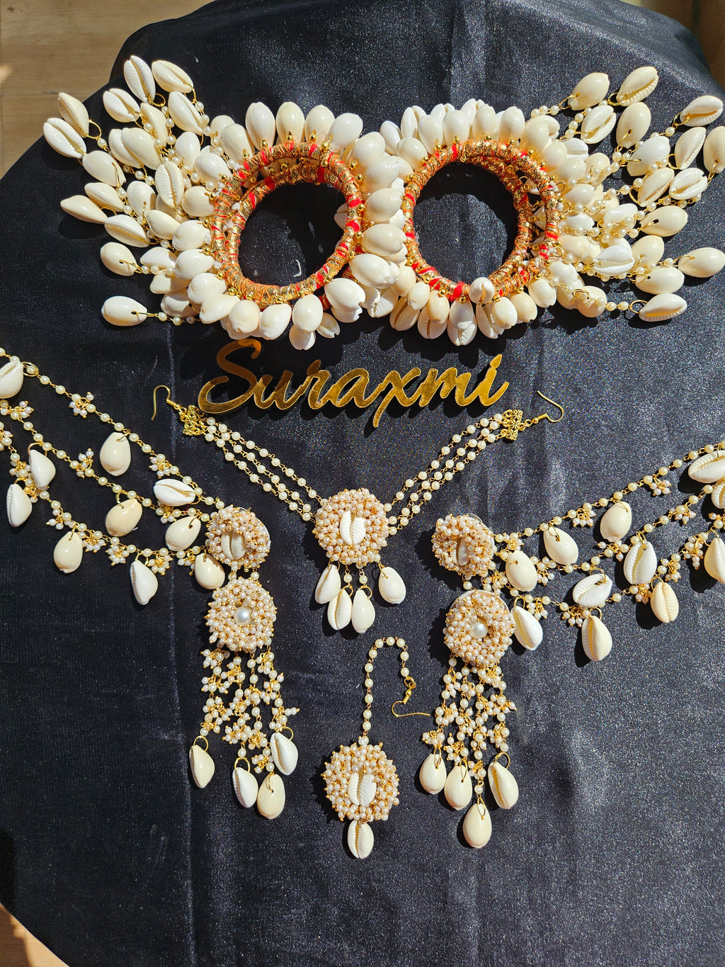 Shell with pearl jewellery