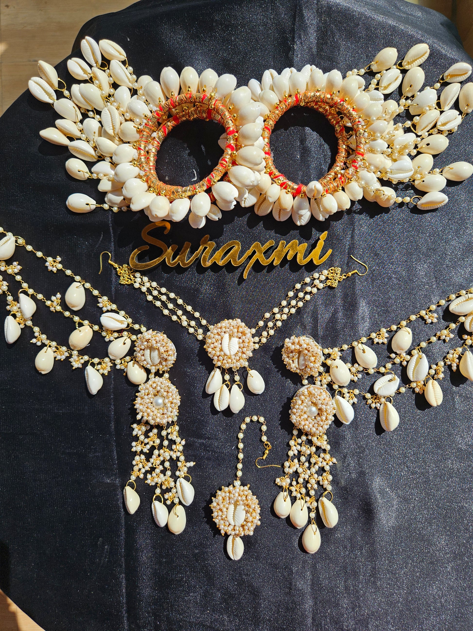 Shell with pearl jewellery