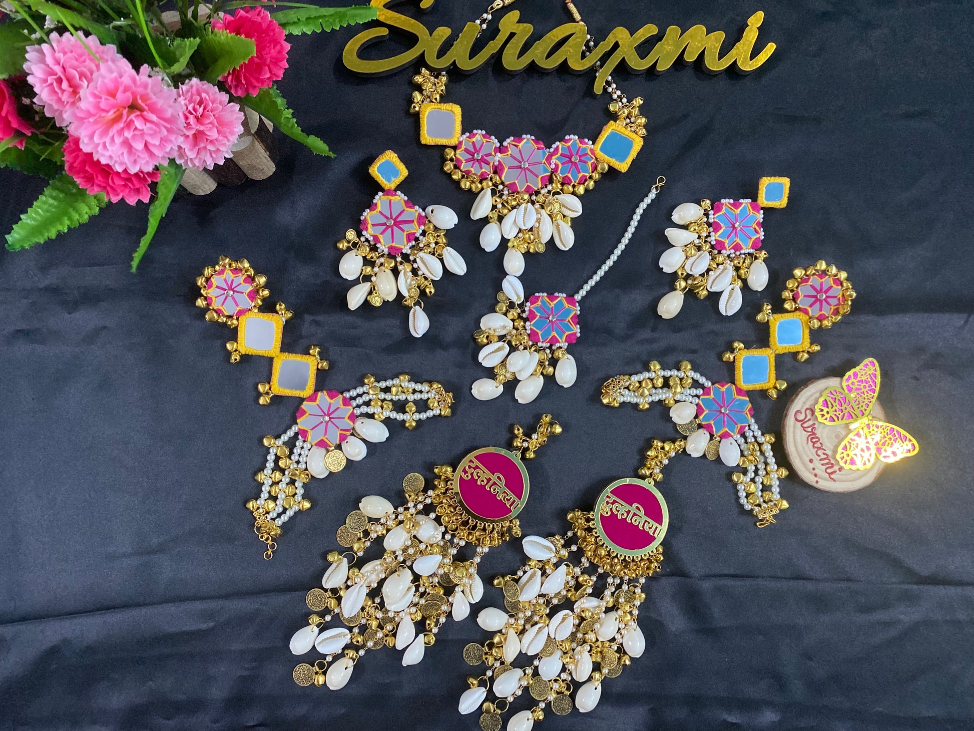 Mirror shell with coin jewellery