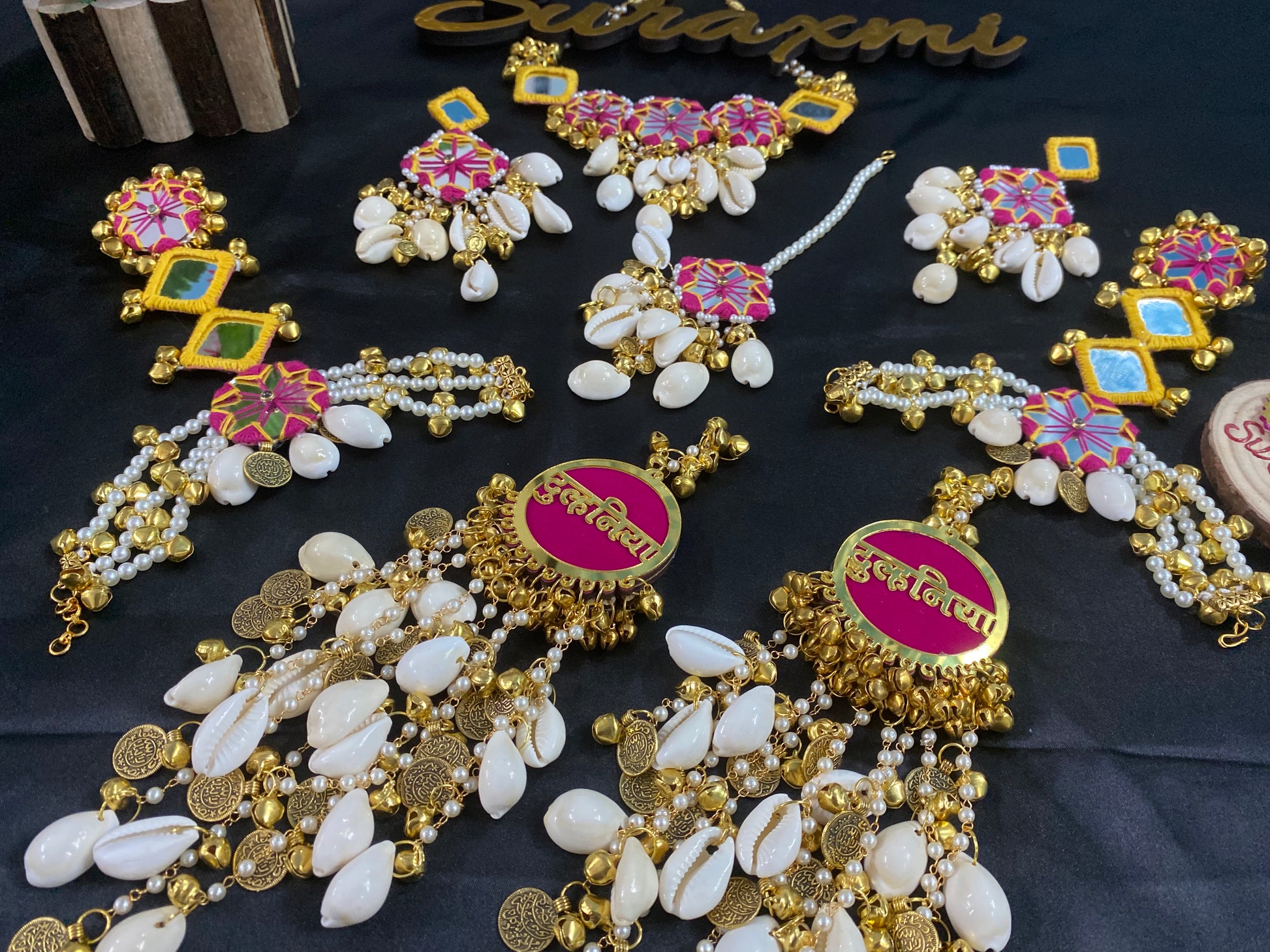 Mirror shell with coin jewellery
