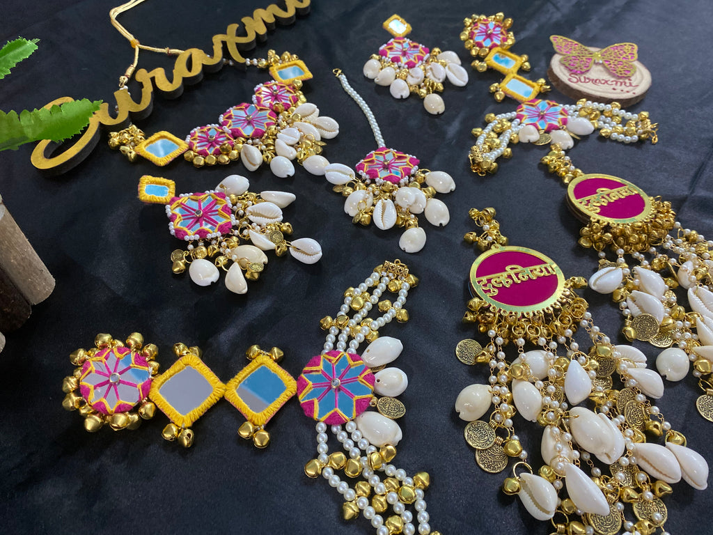 Mirror shell with coin jewellery
