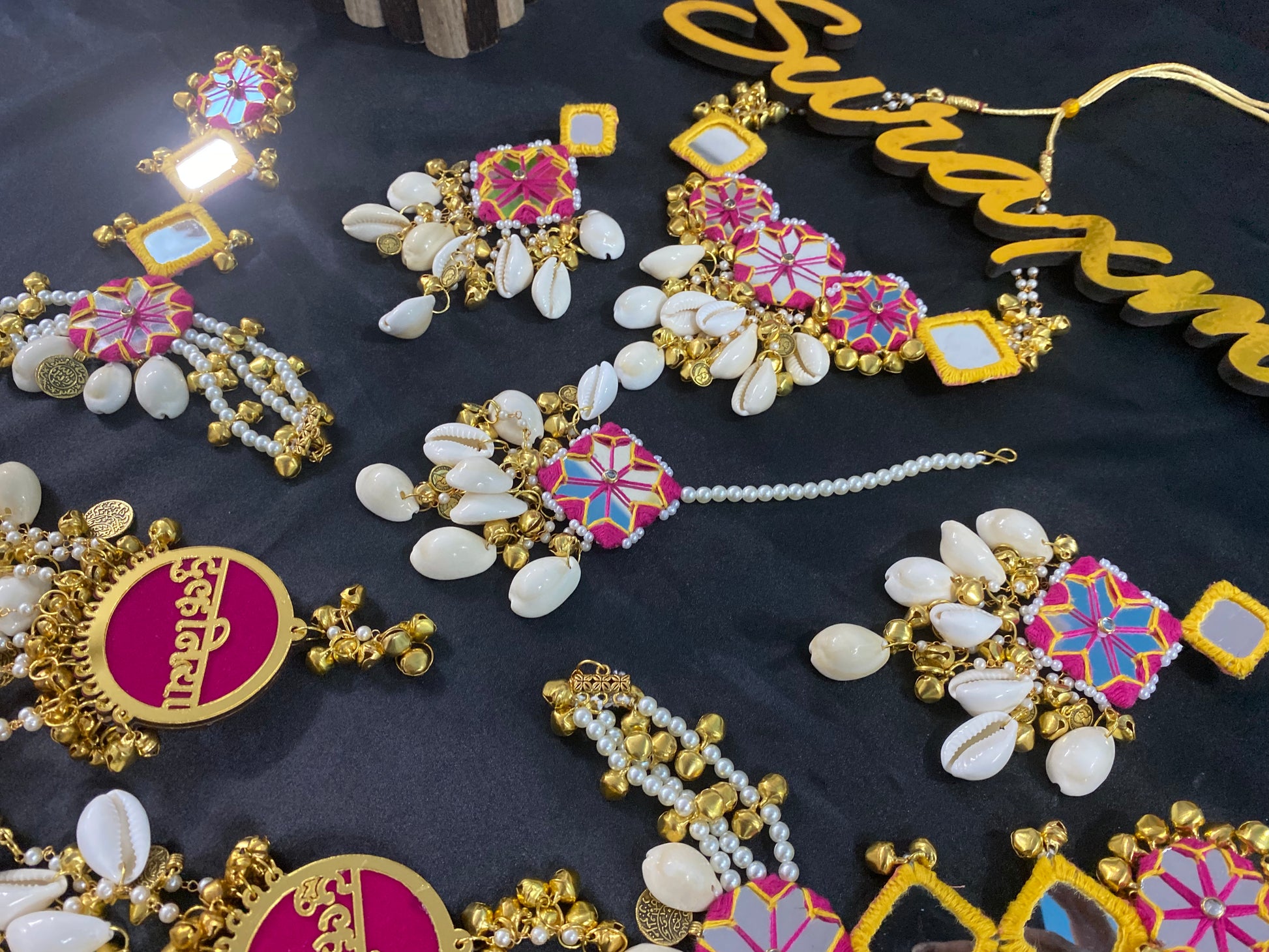Mirror shell with coin jewellery