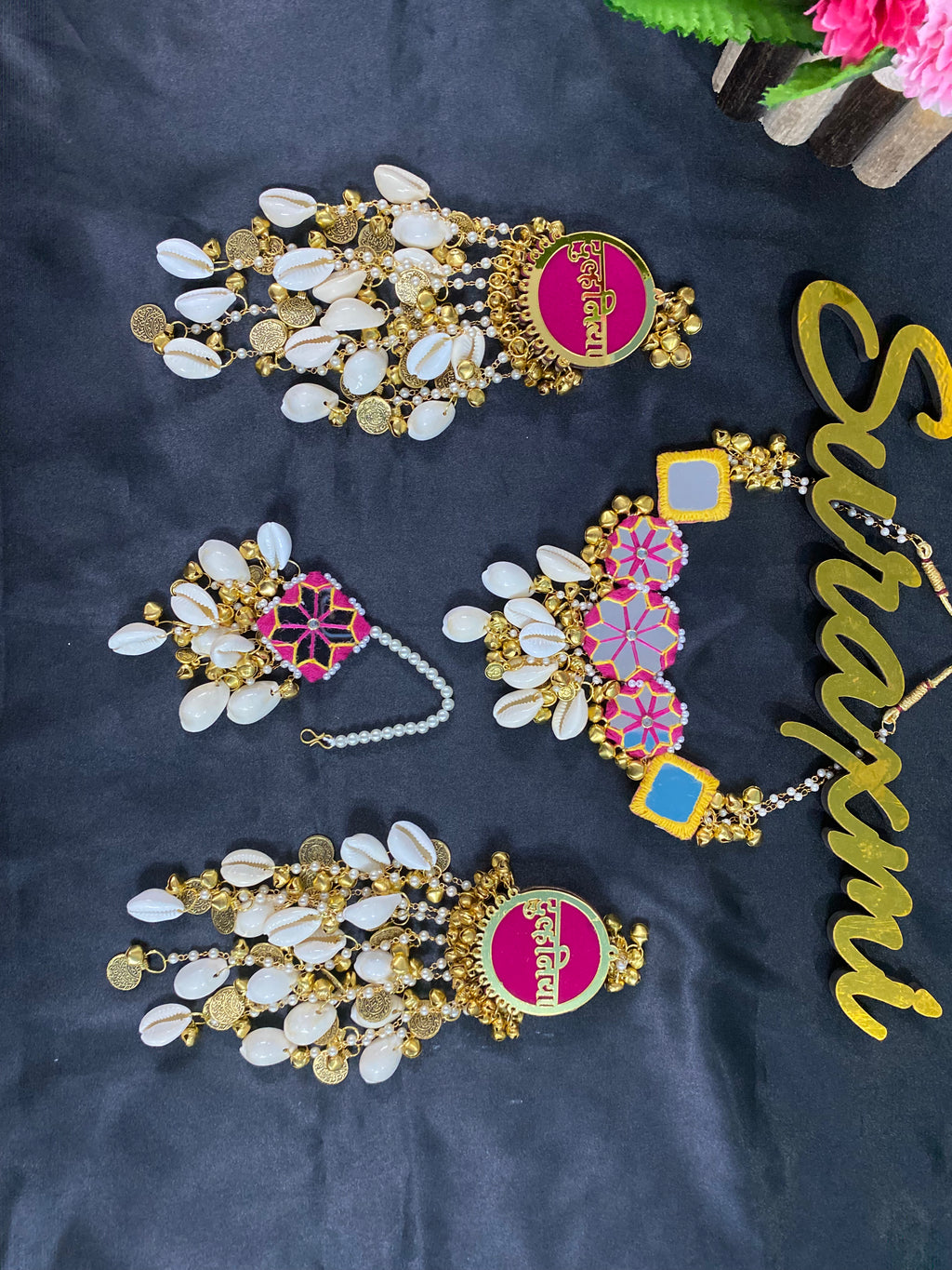 Mirror shell with coin jewellery